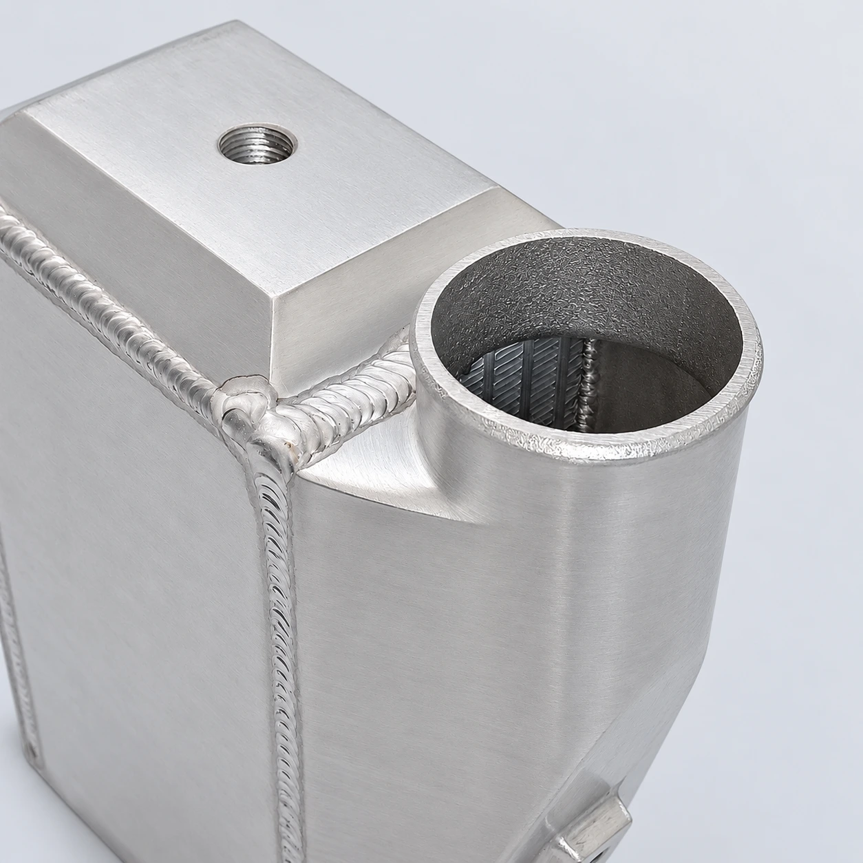 close-up · Air connection, internal fins and weld detail