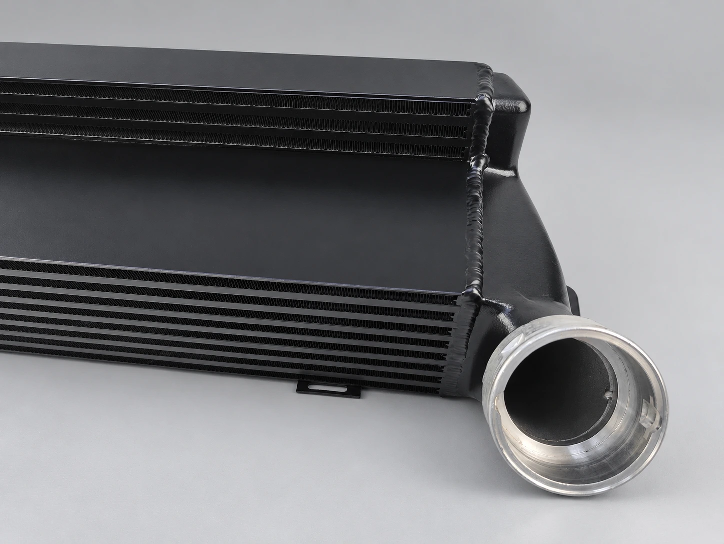 BMW E90 / E91 / E92 / E93 335d Intercooler machined connection, black end tank and welded seams