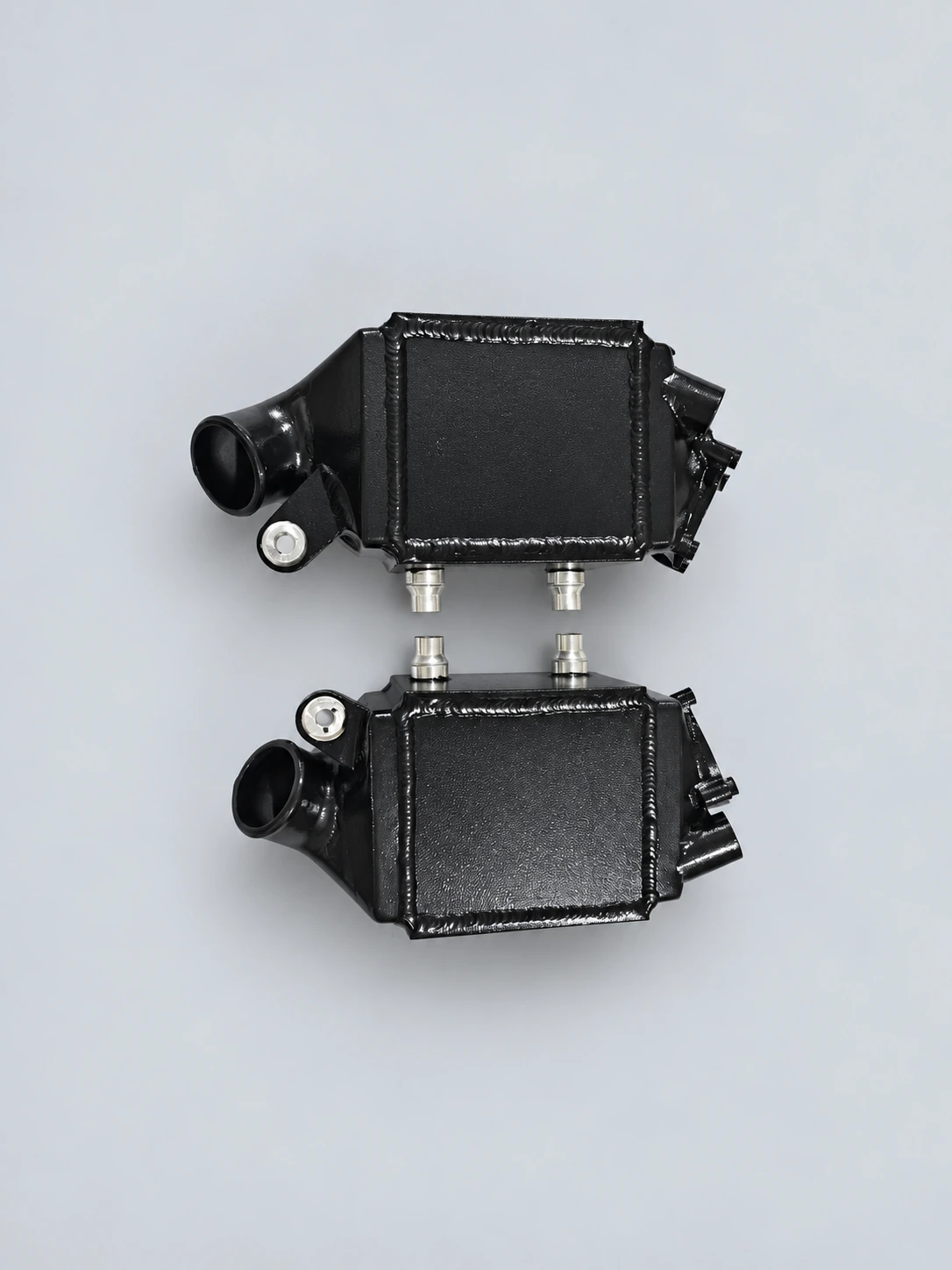 BMW M5/M6 Opposite top view — paired housings and mounting details