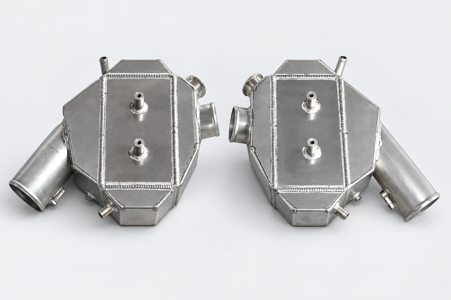 Matched pair — coolant connections and welded housings