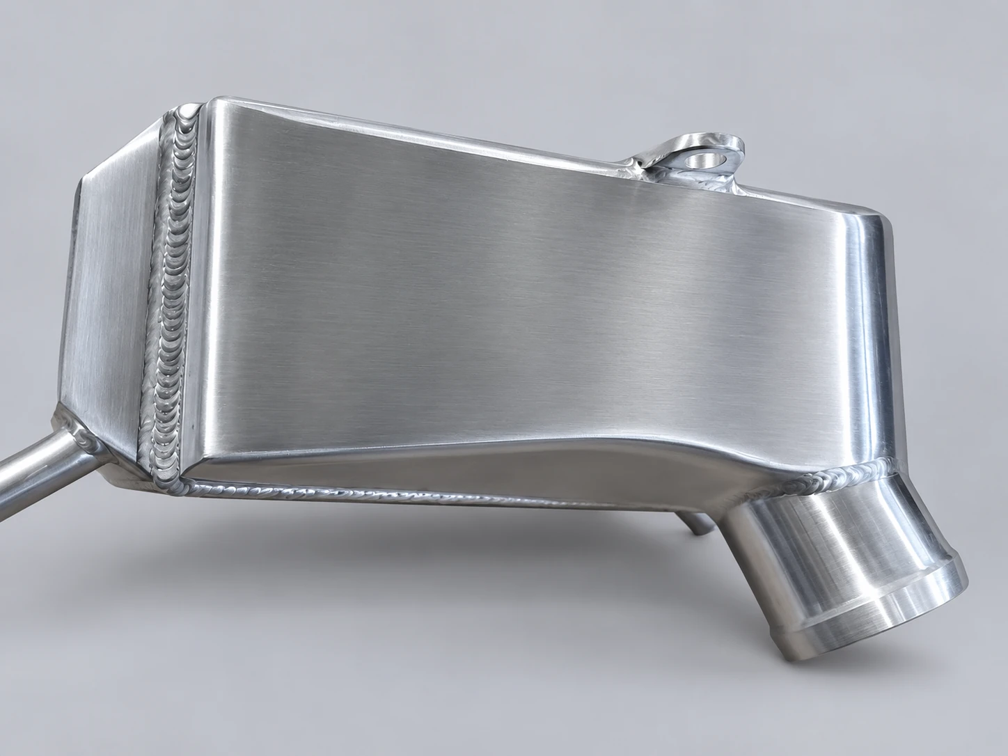 Ford 6.7L Powerstroke Housing detail — machined aluminum and weld seam