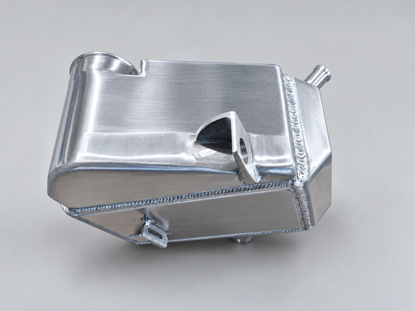 Ford 6.7L Powerstroke Angled mounting view — tabs and tank construction