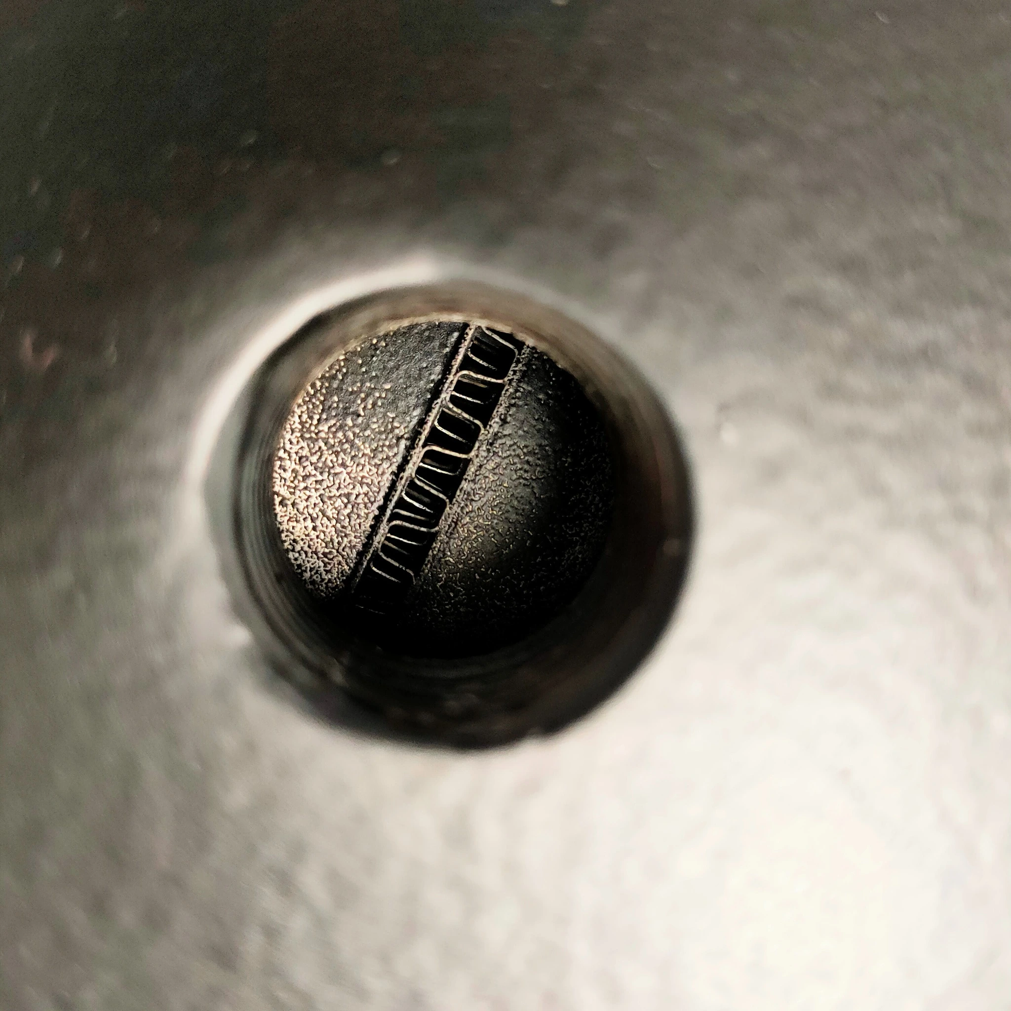 Yamaha 1.8L intercooler water passage detail, photographed through the smaller water connection